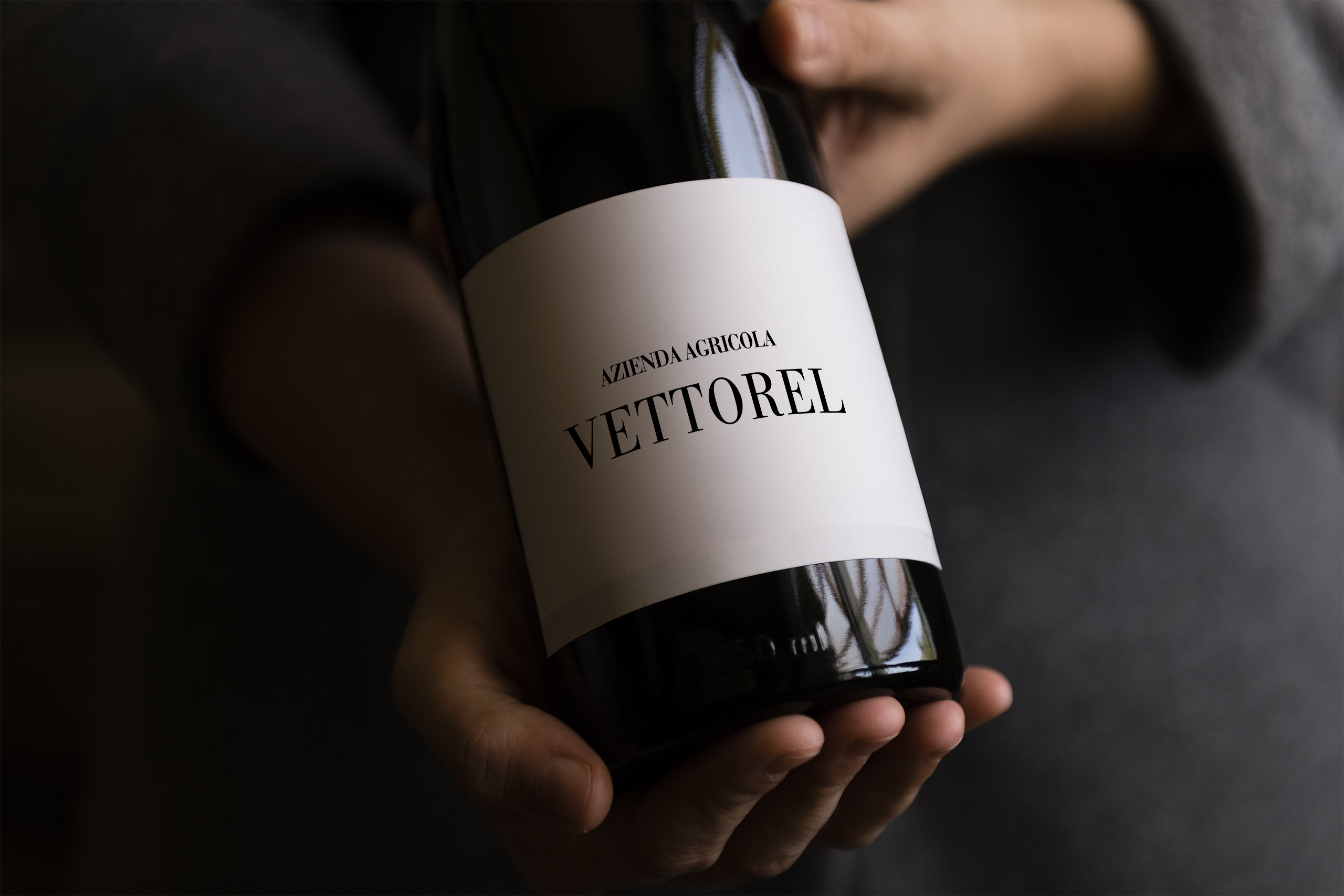 Woman holding a bottle of wine